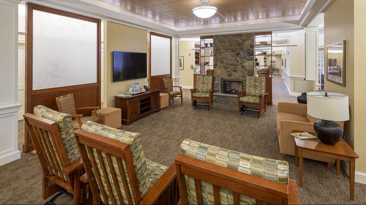 Common area with seating and a fireplace