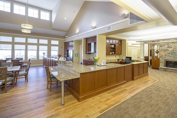 Interior view of a dining area with a kitchen