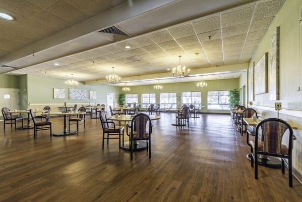 Dining room with wooden tables and chairs