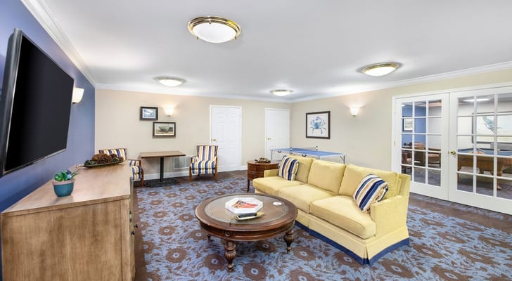 Bright common area with seating and decor