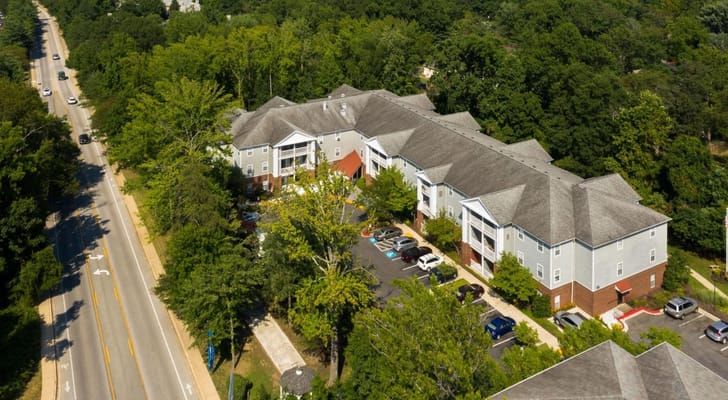 Aerial view of the assisted living facility with surrounding greenery