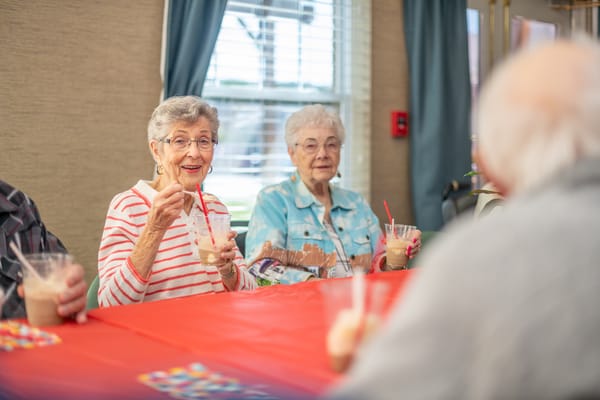 Residents enjoying frozen treats in a common area