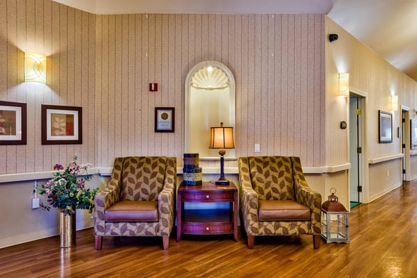 Cozy lounge area with comfortable chairs and decor