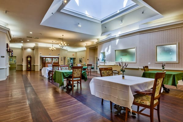 Bright dining area with tables and chairs