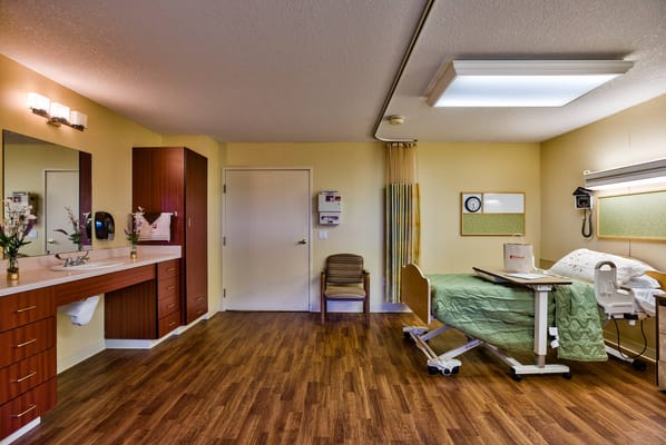 Comfortable private resident room with medical equipment