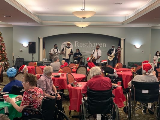 Residents enjoying live music during a festive celebration