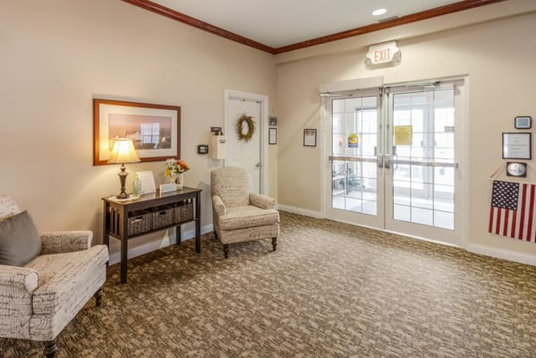Interior view of a cozy common area with seating
