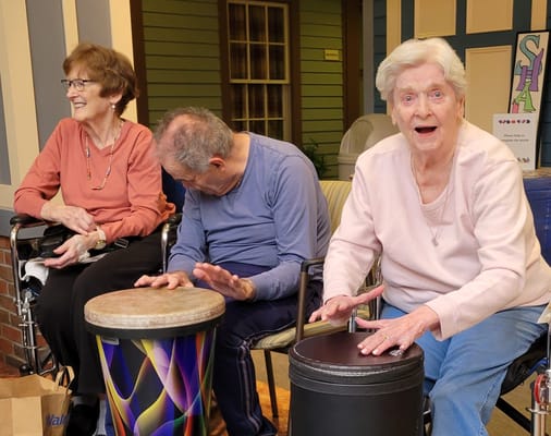 Residents participating in a music activity session