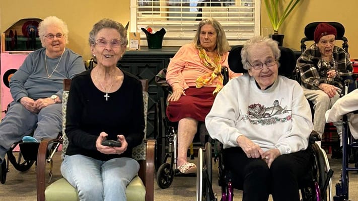 Residents enjoying a social gathering in a common area