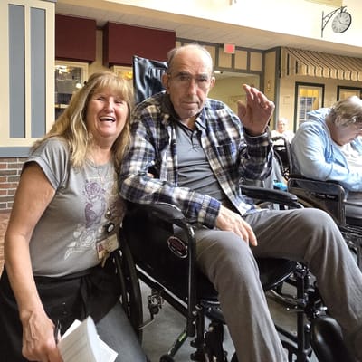 Staff member with a resident in a common area