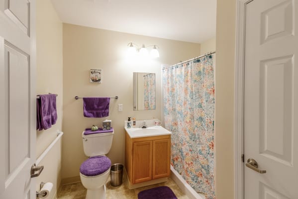 Bright and clean bathroom with colorful decor