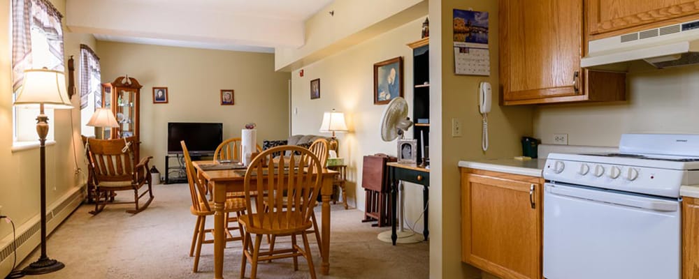 Cozy living space with dining area and kitchen
