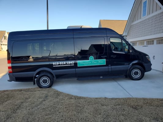 Facility transport van parked outside a home