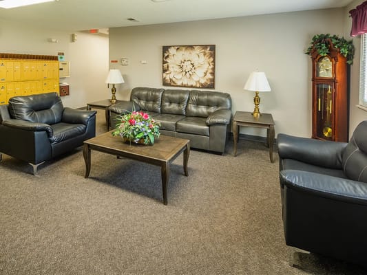 A cozy common area with seating and decorations