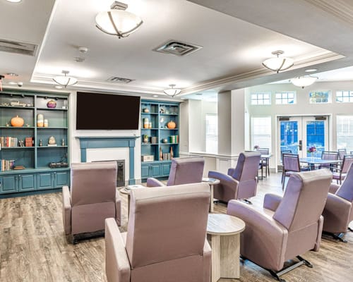 Spacious common area with comfortable seating and decor