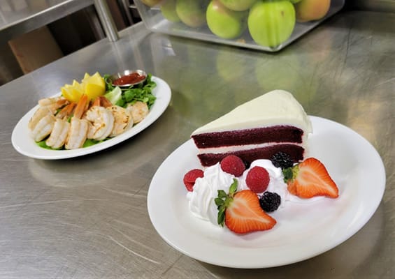 Delicious dessert and shrimp platter served in the dining area