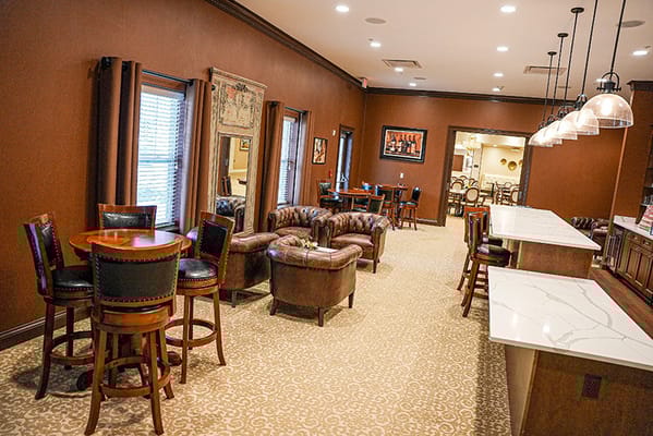 Interior view of a cozy common area with seating