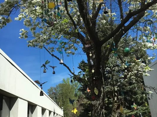 Decorative tree with butterflies in an outdoor space
