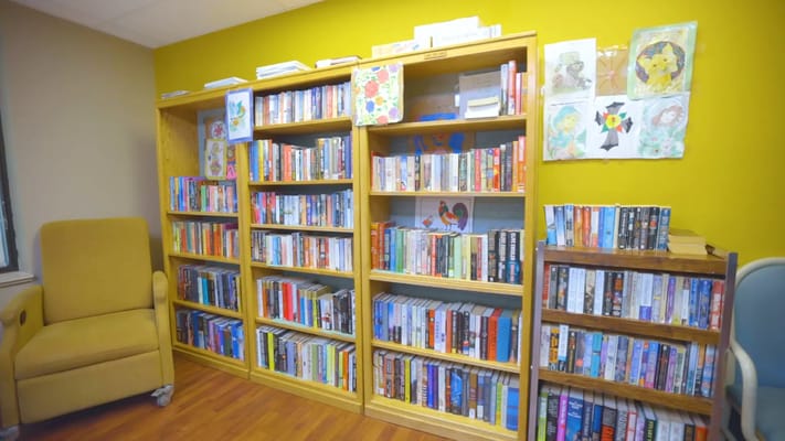 Interior shelves filled with books in a reading area
