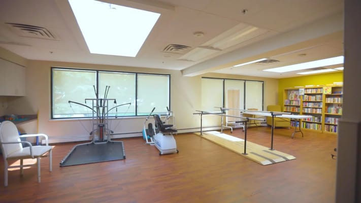 Interior view of a therapy room with equipment