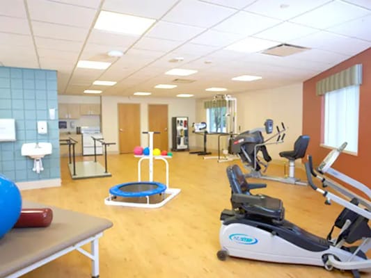 Interior view of a fitness area with exercise equipment