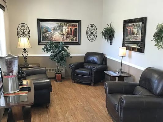 Cozy common area with seating and artwork