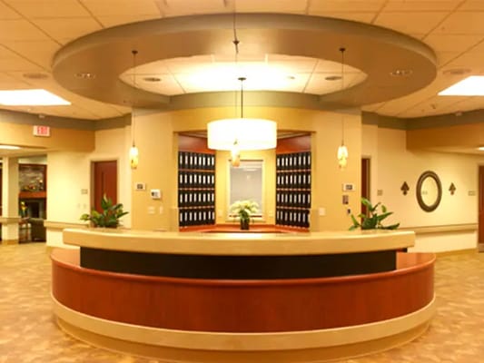 Lobby area with reception desk and seating