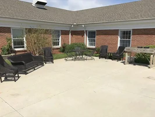 Outdoor seating area with chairs and table