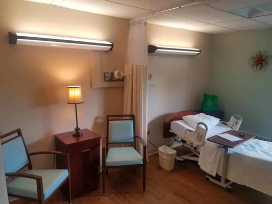 Interior room with a bed and seating area