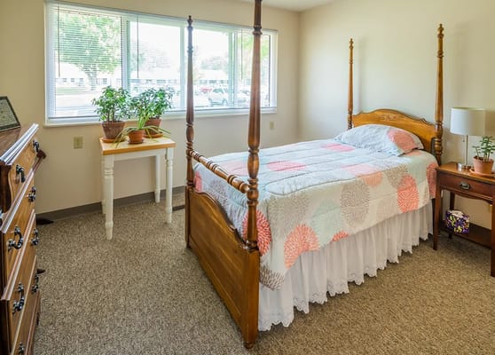 Cozy bedroom setup in a senior living apartment