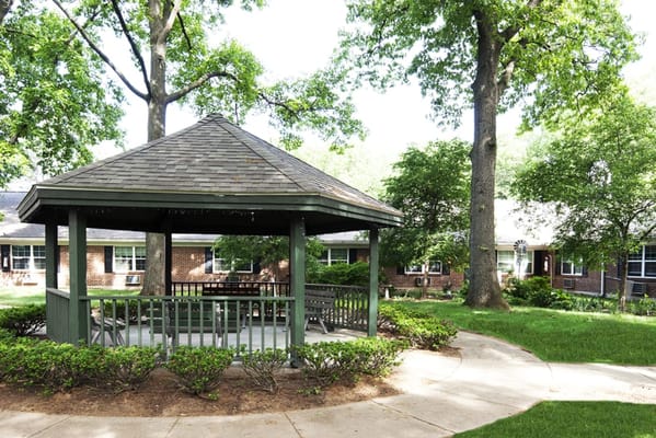 Outdoor gazebo in a landscaped area