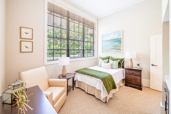 Cozy private room with a bed and seating area