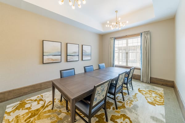 Bright, modern conference room with a large table