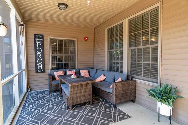 Cozy porch area with seating and decor