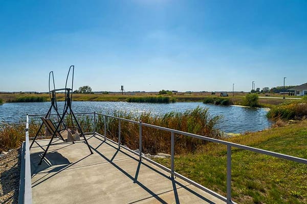 Scenic view of a pond and walking path