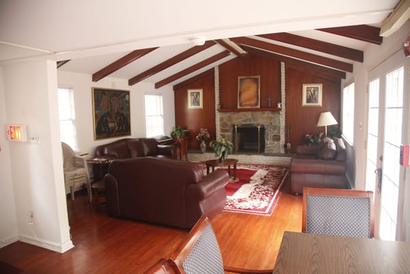 Cozy common area with seating and fireplace