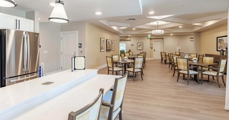 Bright dining room with tables and chairs