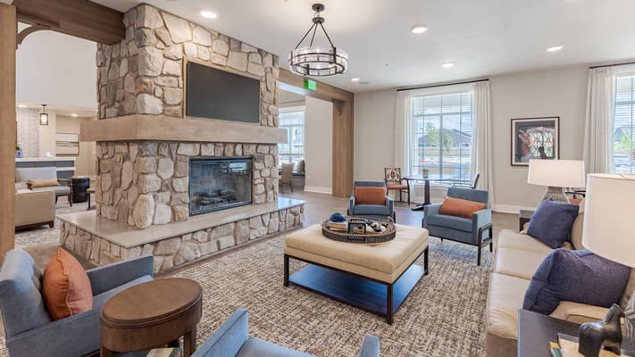 Cozy common area with a fireplace and comfortable seating