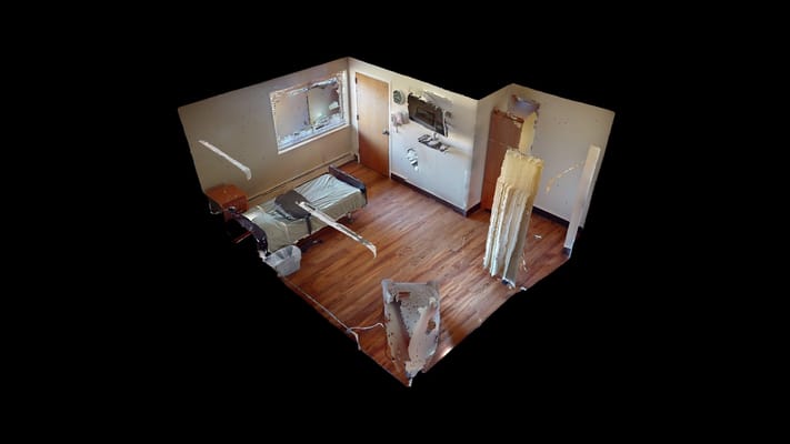 Private resident room with bed and furnishings