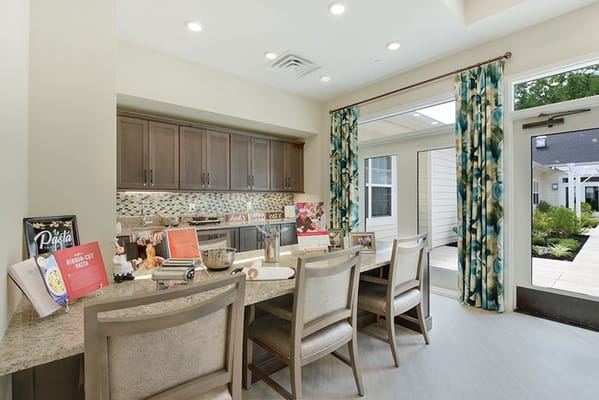 Bright dining area with a view of the outdoor garden