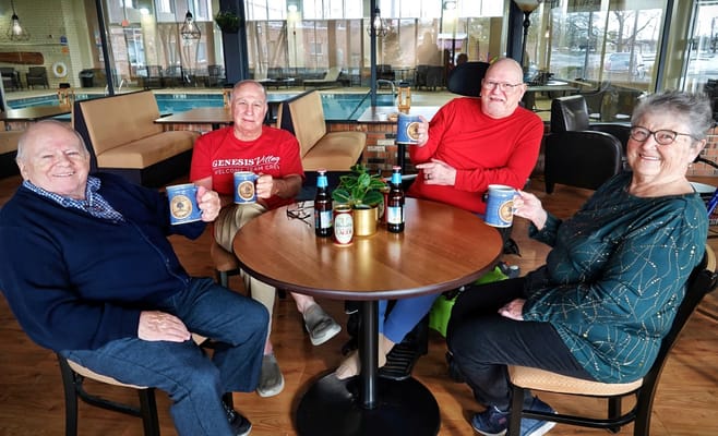 Residents enjoying beverages in a common area