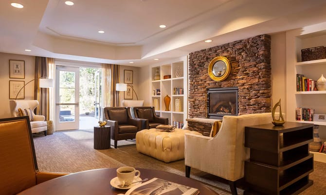 Cozy common area with seating and a fireplace