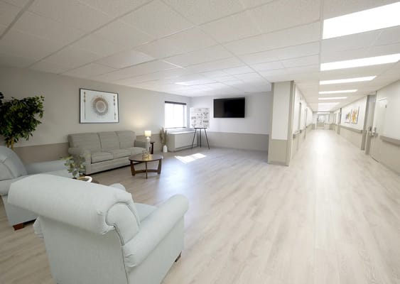 Bright common area with seating and large hallway