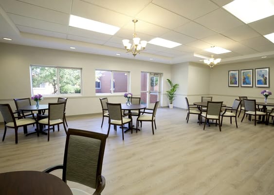 Bright common area with seating and plants