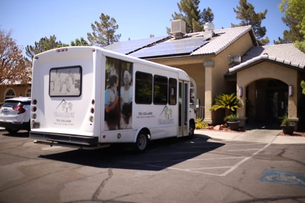 Facility's shuttle bus parked outside the entrance