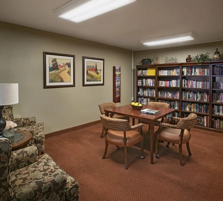 Cozy library area with books and seating