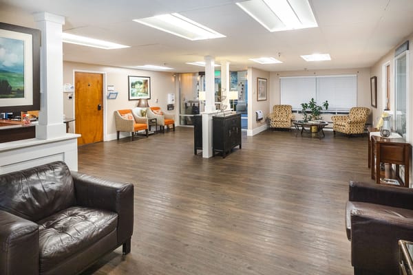 Bright and spacious common area with seating.
