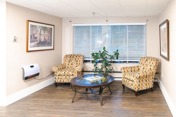 Cozy interior seating area with patterned chairs