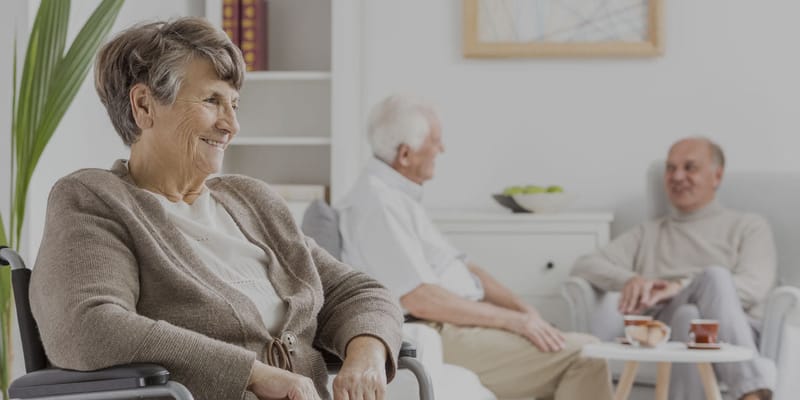 Residents engaging in conversation in a common area