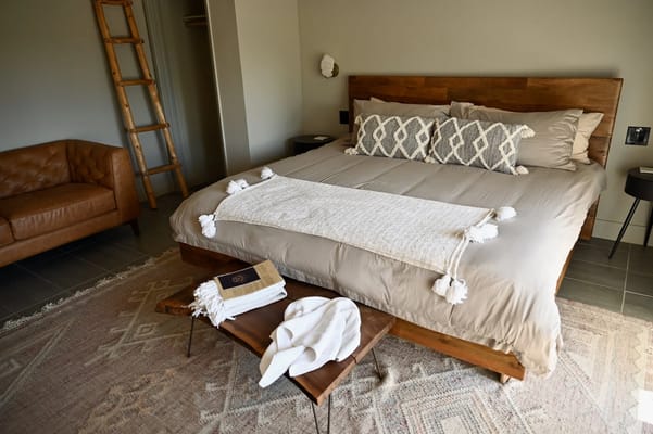 A well-furnished private bedroom with a cozy atmosphere